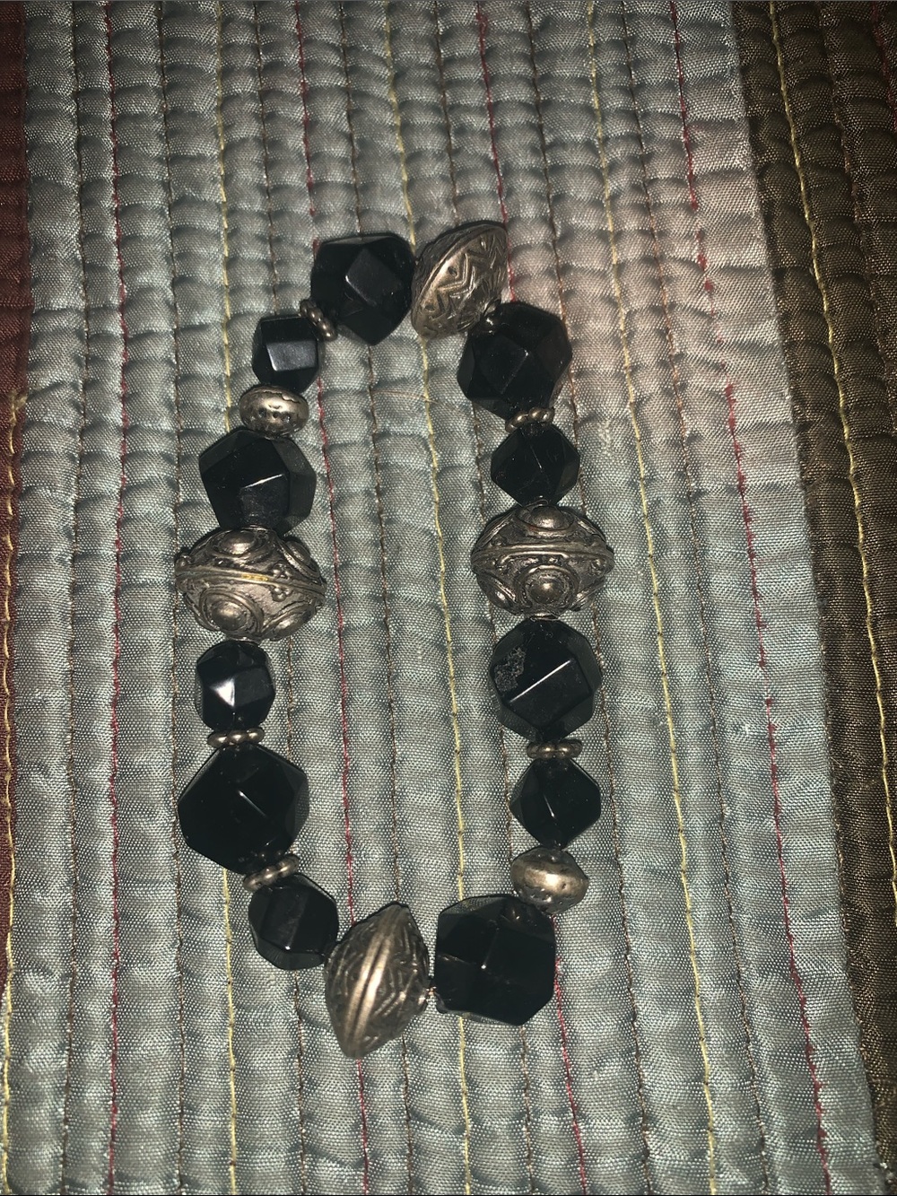 Silver/Onyx faceted bracelet.

Easily vintage